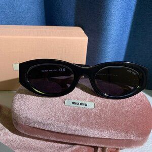 Miu Miu Black Oval Sunglasses with Case